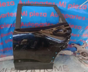 PUERTA TRACERA IZQUIERDA CHEVROLET TRACKER 2020 2021 2022 2023 LEVE DETALLE