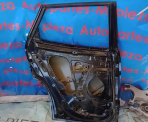 PUERTA TRACERA IZQUIERDA CHEVROLET TRACKER 2020 2021 2022 2023 LEVE DETALLE - Imagen 3